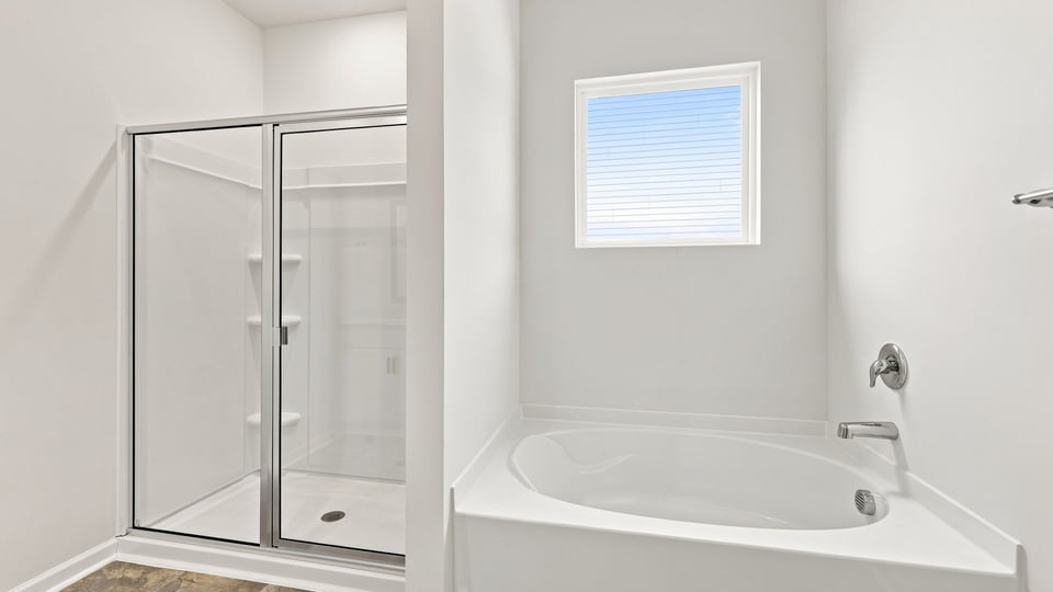 Primary bathroom with double vanity sink.