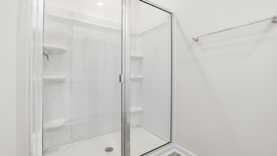 Primary bathroom with double vanity sinks.