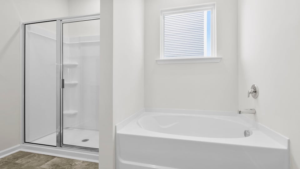 Primary bathroom with double vanity sinks.