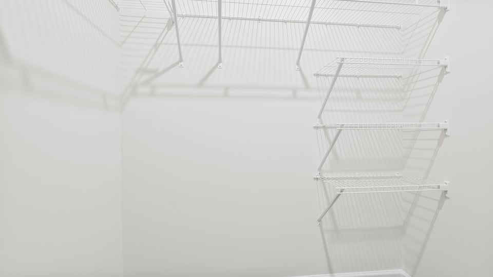 Primary closet with shelf.