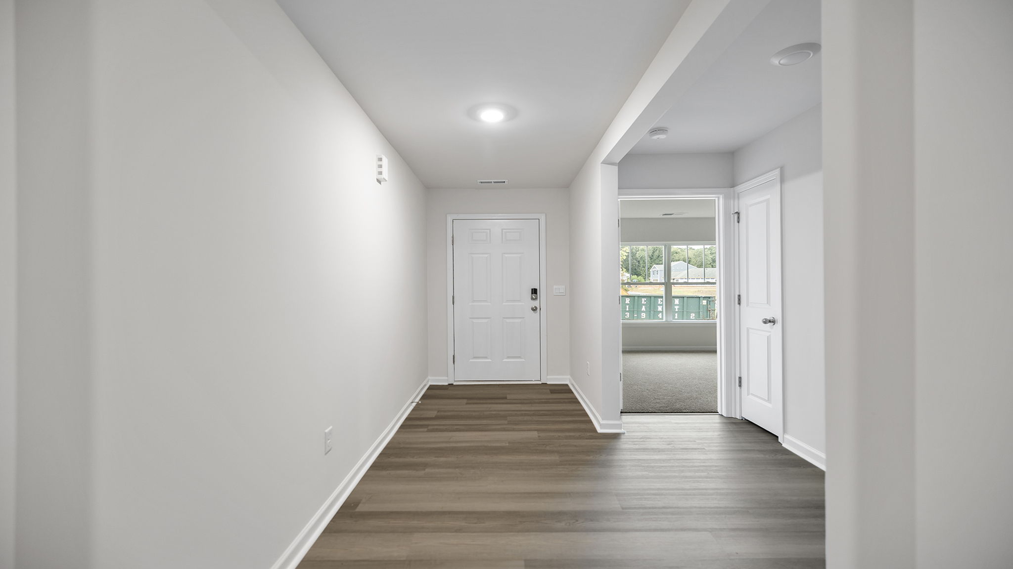 View of entrance and front bedroom entry,