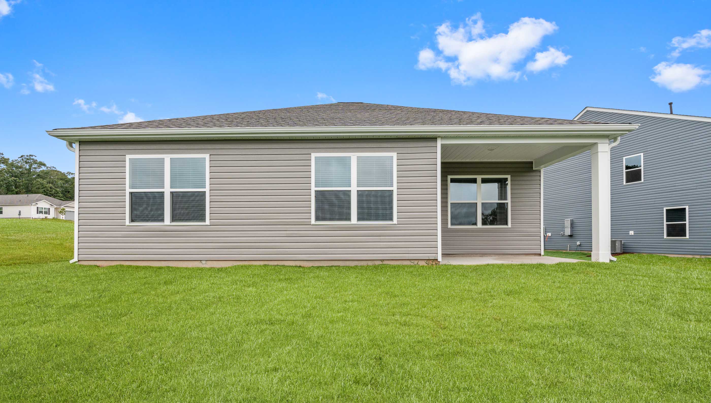 Back exterior view of the Aria covered porch.