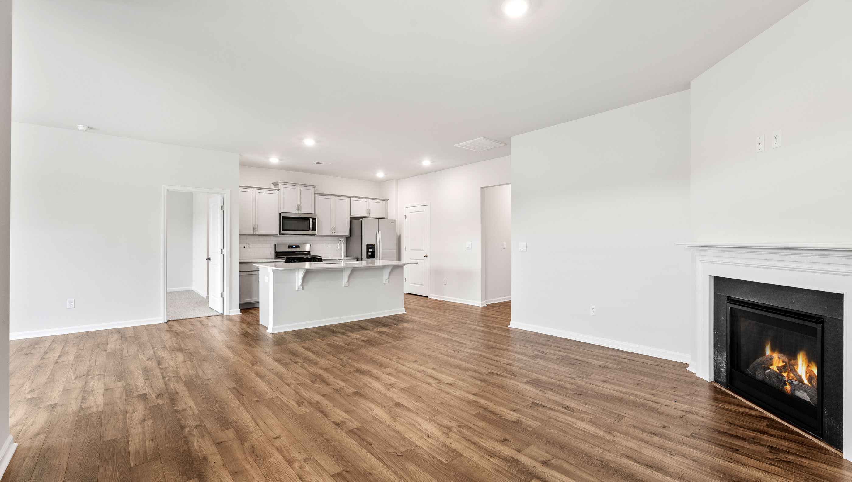 View of the family room and open kitchen.