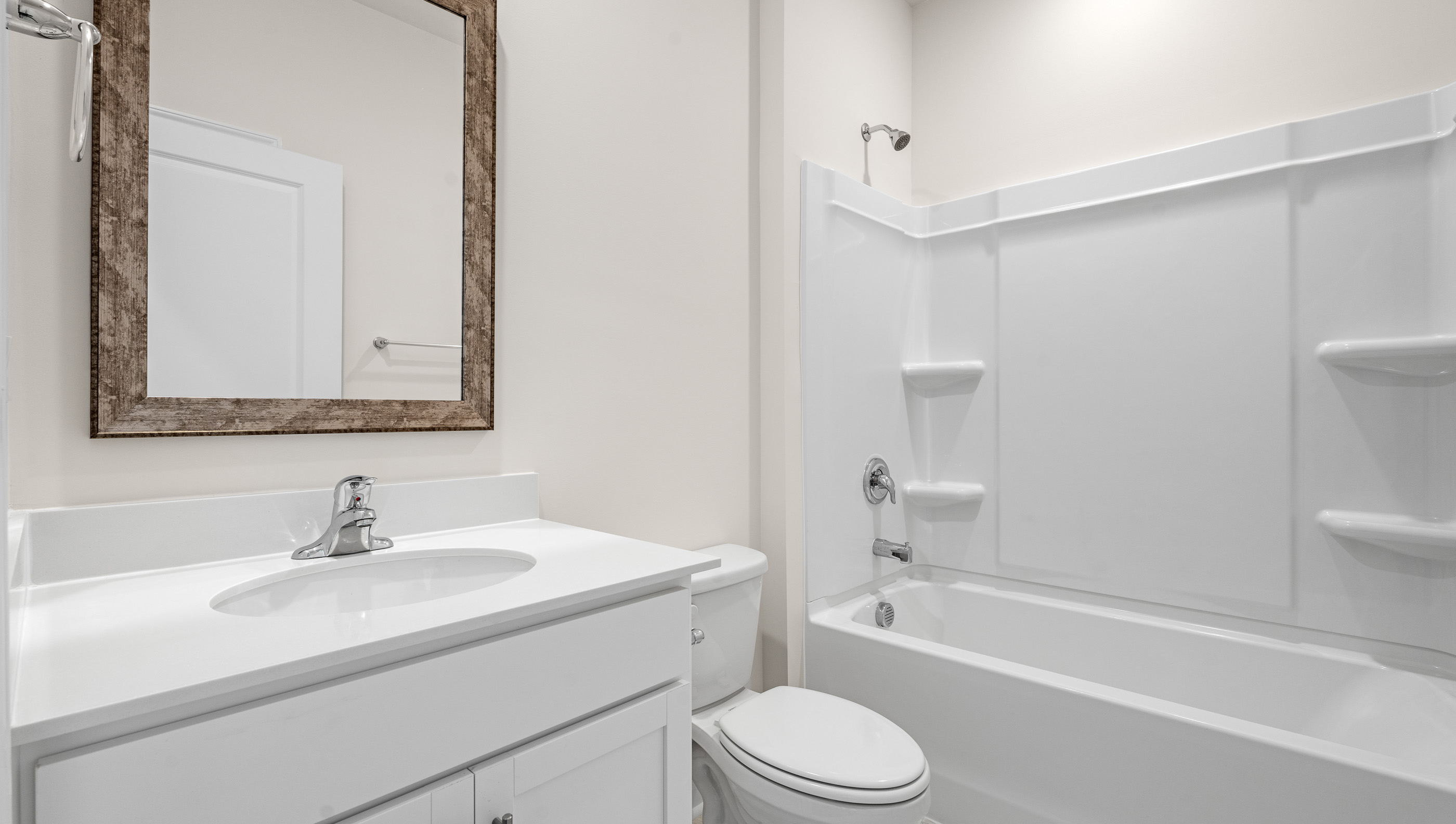 Bathroom with vanity and tub.
