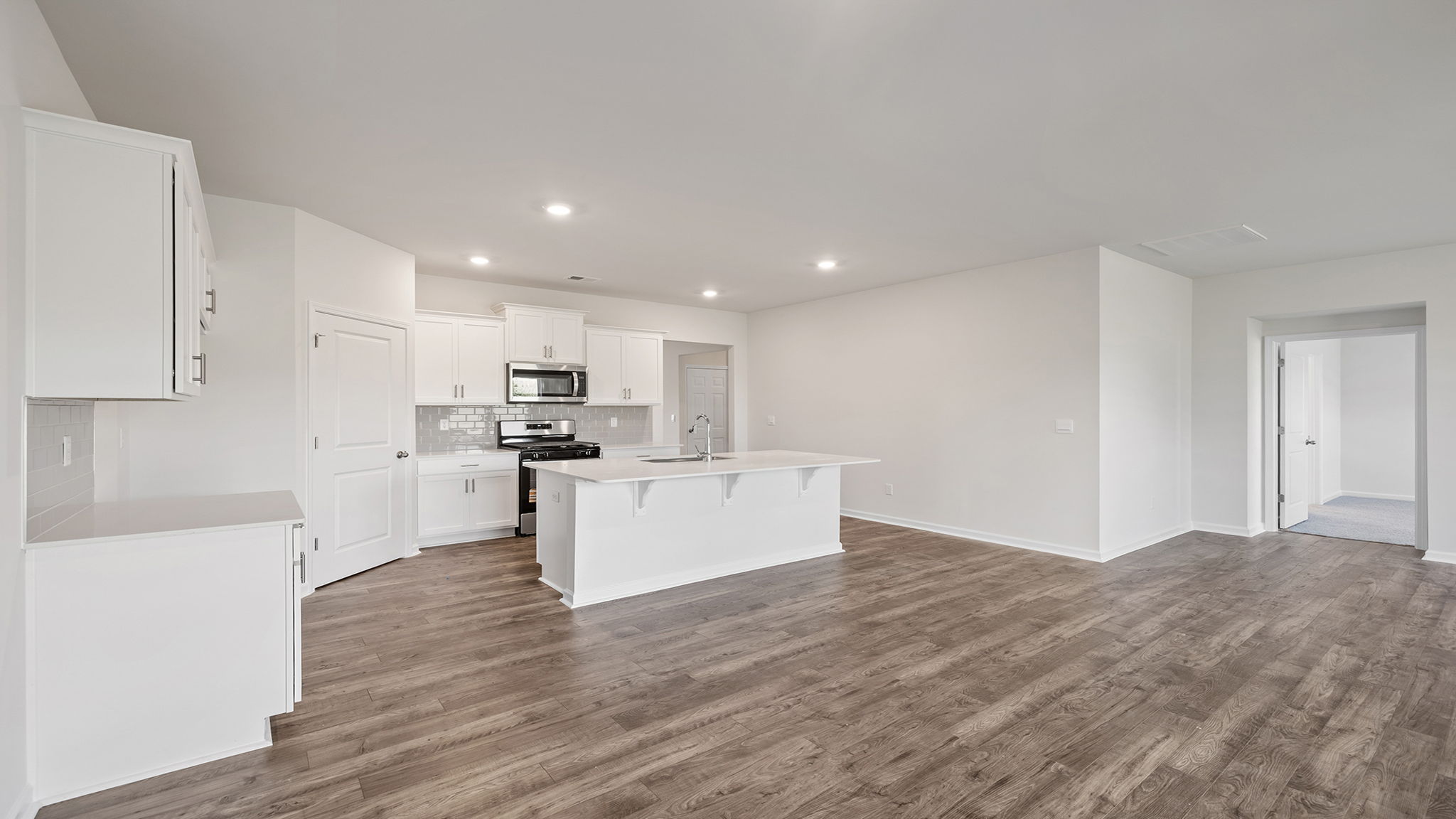 Living area with cabinet and fireplace.