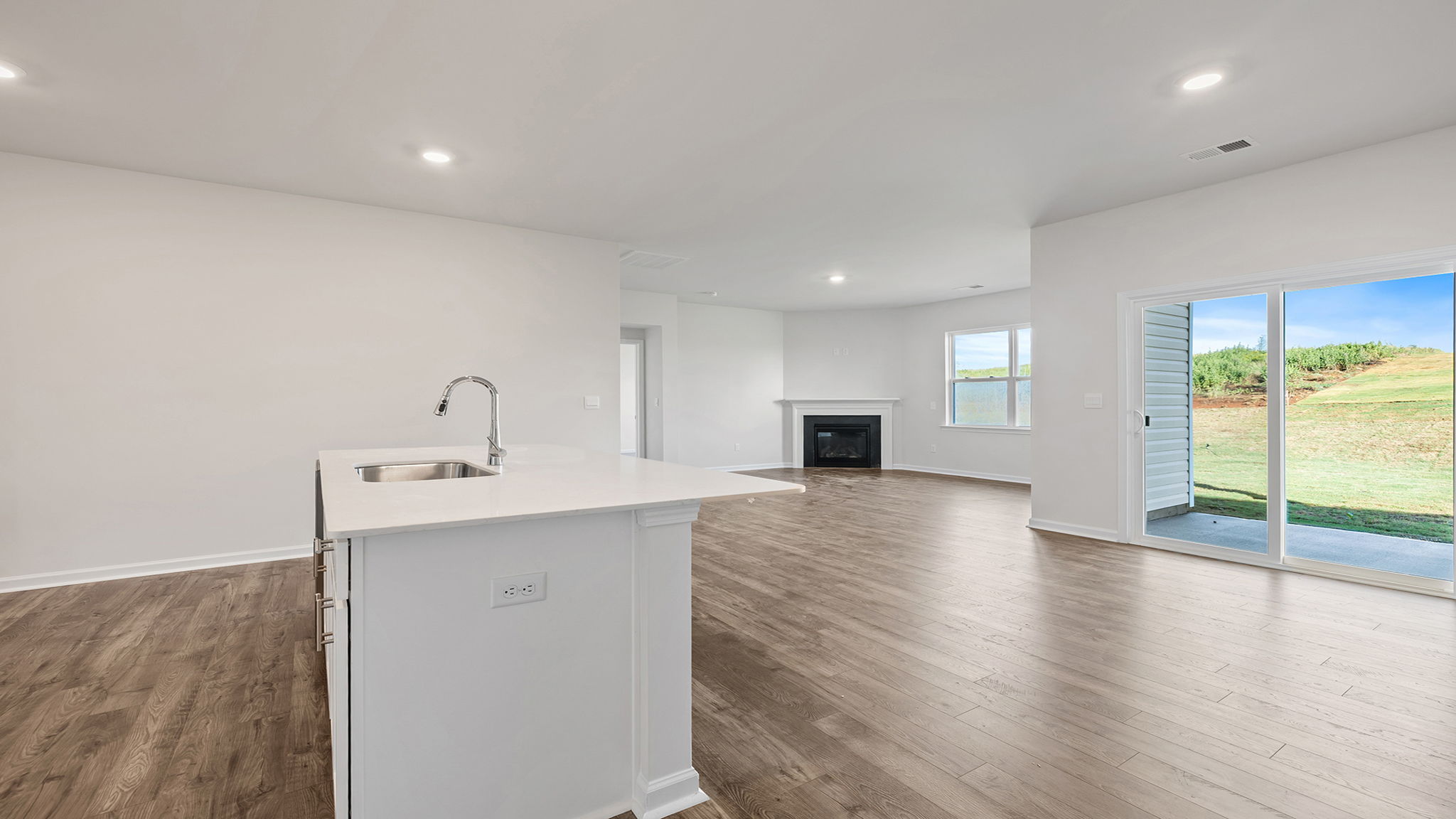 Living area with cabinet and fireplace.