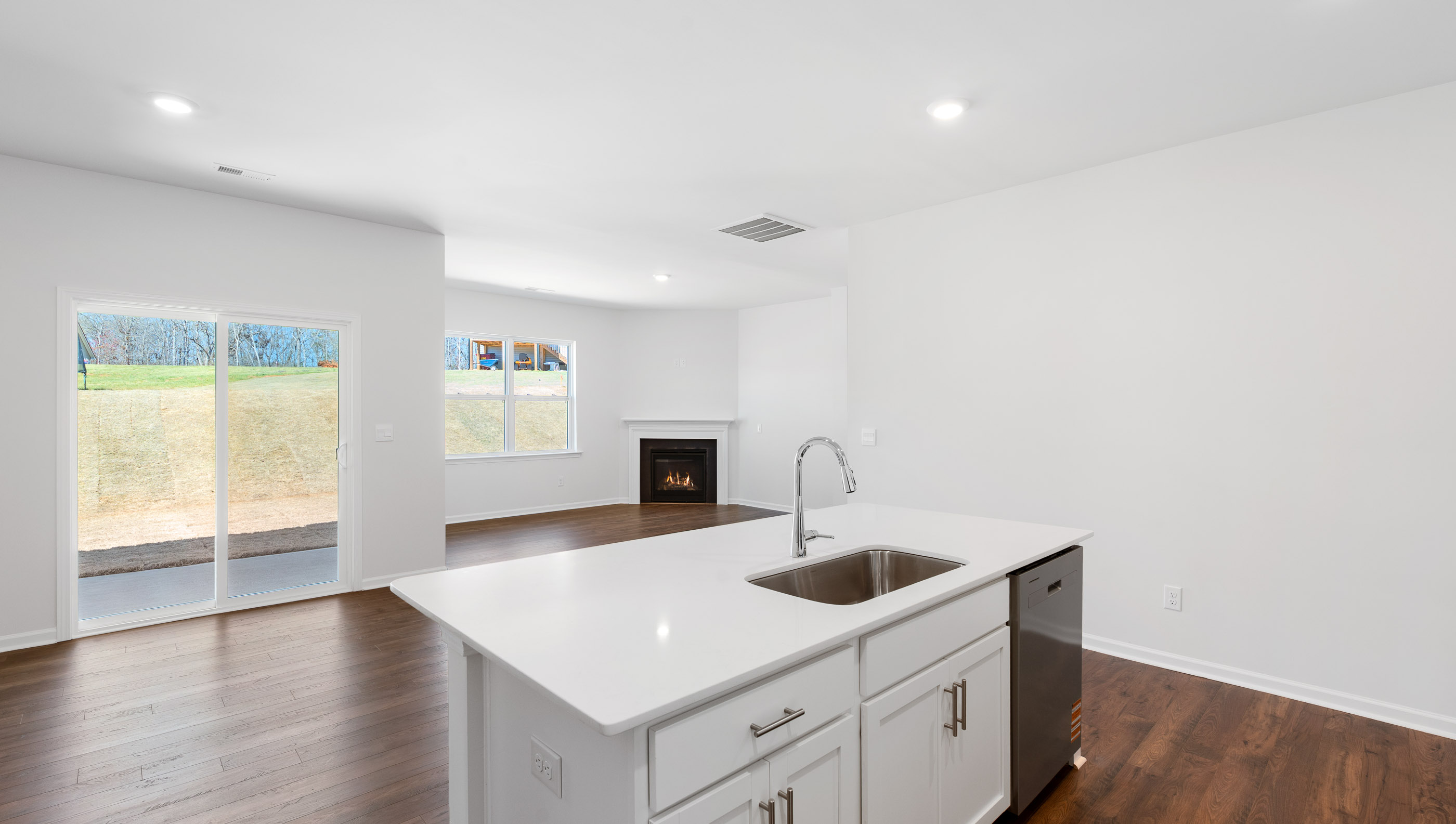 Kitchen with quartz countertops.
