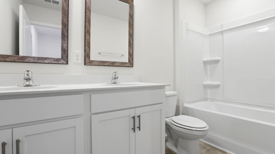 Bathroom with double vanity sink.