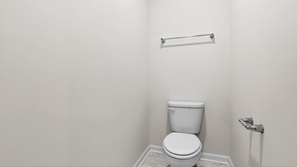 Primary bathroom with double vanity sinks.
