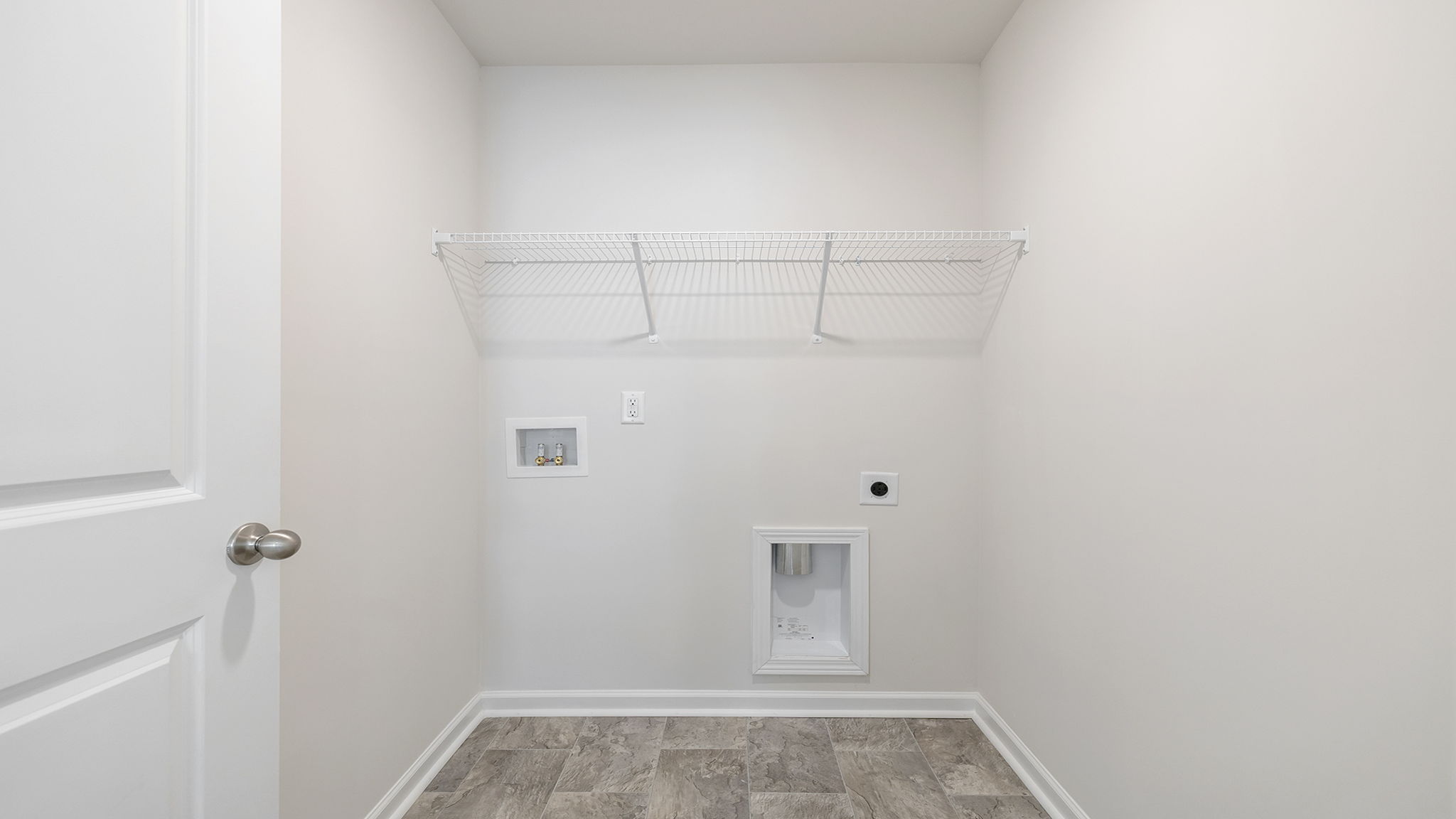 Walk-in laundry room.