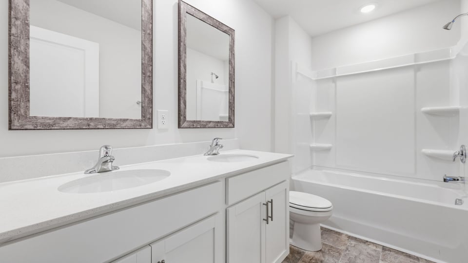 Bathroom with double vanity sinks.