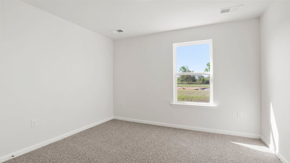 Loft area with windows.