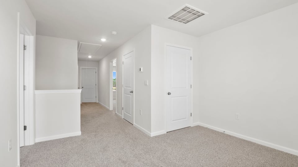 Loft area with windows.