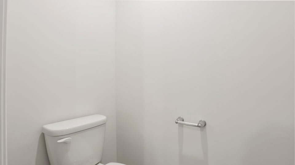 Primary bathroom with double vanity sinks.