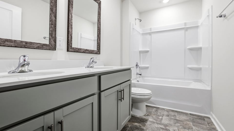 Bathroom with double vanity sink.