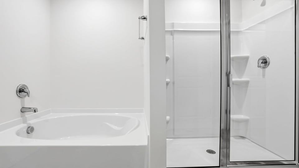 Primary bathroom with double vanity sinks.