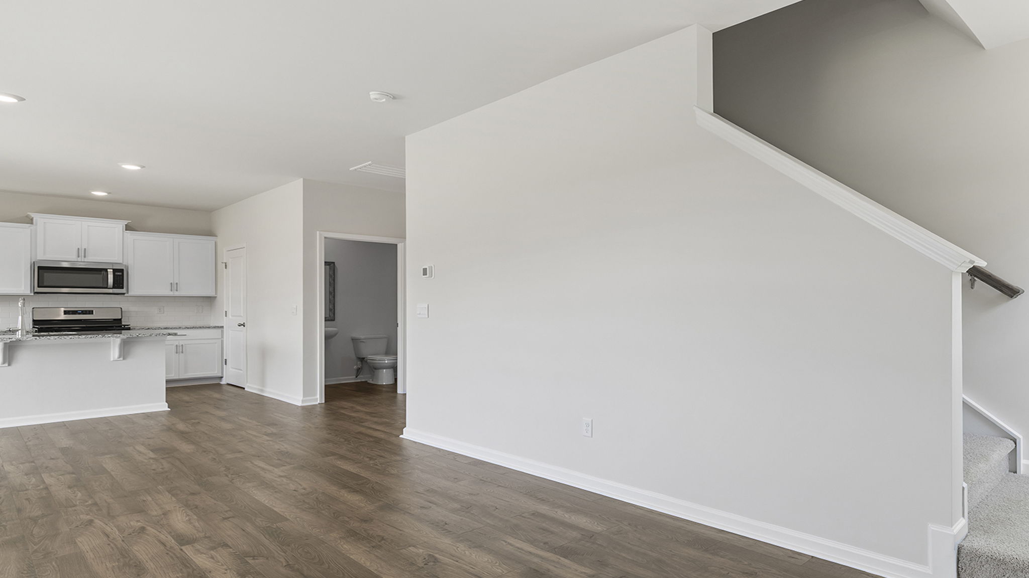 View of staircase to the upper level.