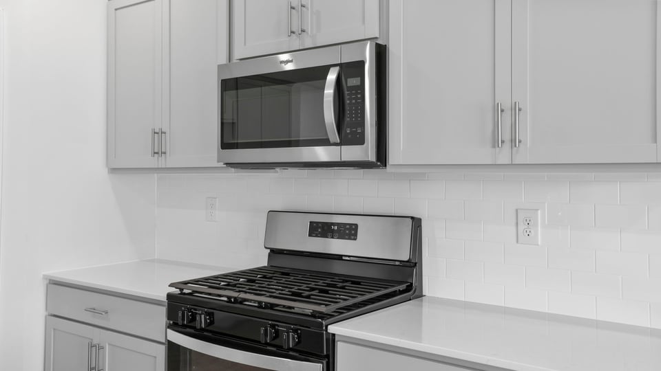 Kitchen with stainless steel appliances.