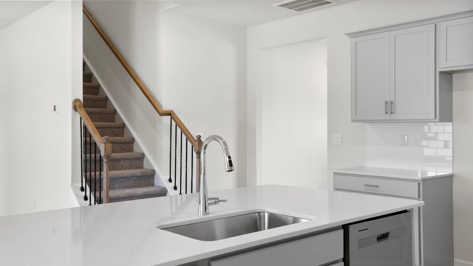 Kitchen with stainless steel appliances.