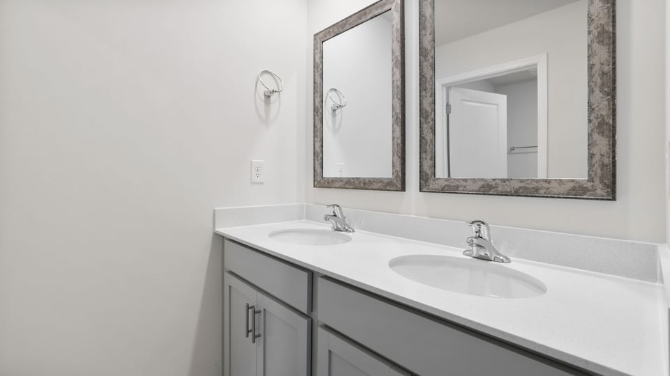 Bathroom with double vanity sink.