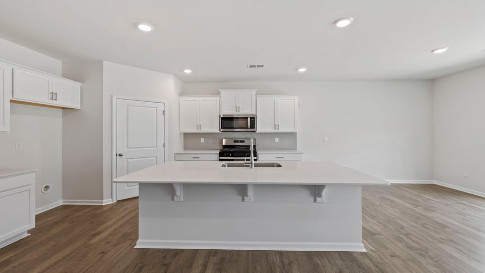 Kitchen island with quartz countertops.