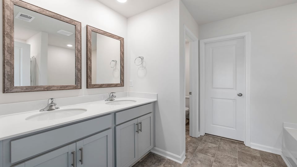 Primary bathroom with double vanity sink/