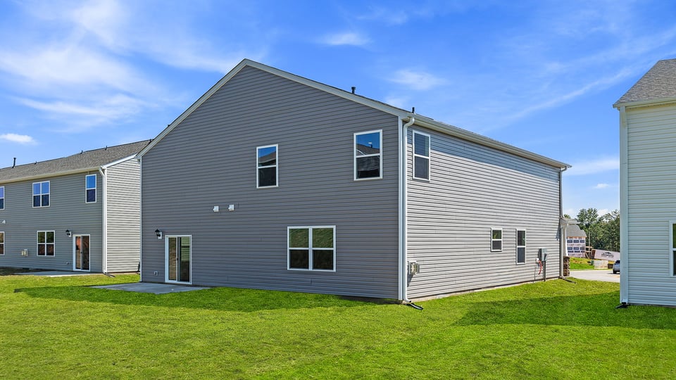 Back exterior with patio.