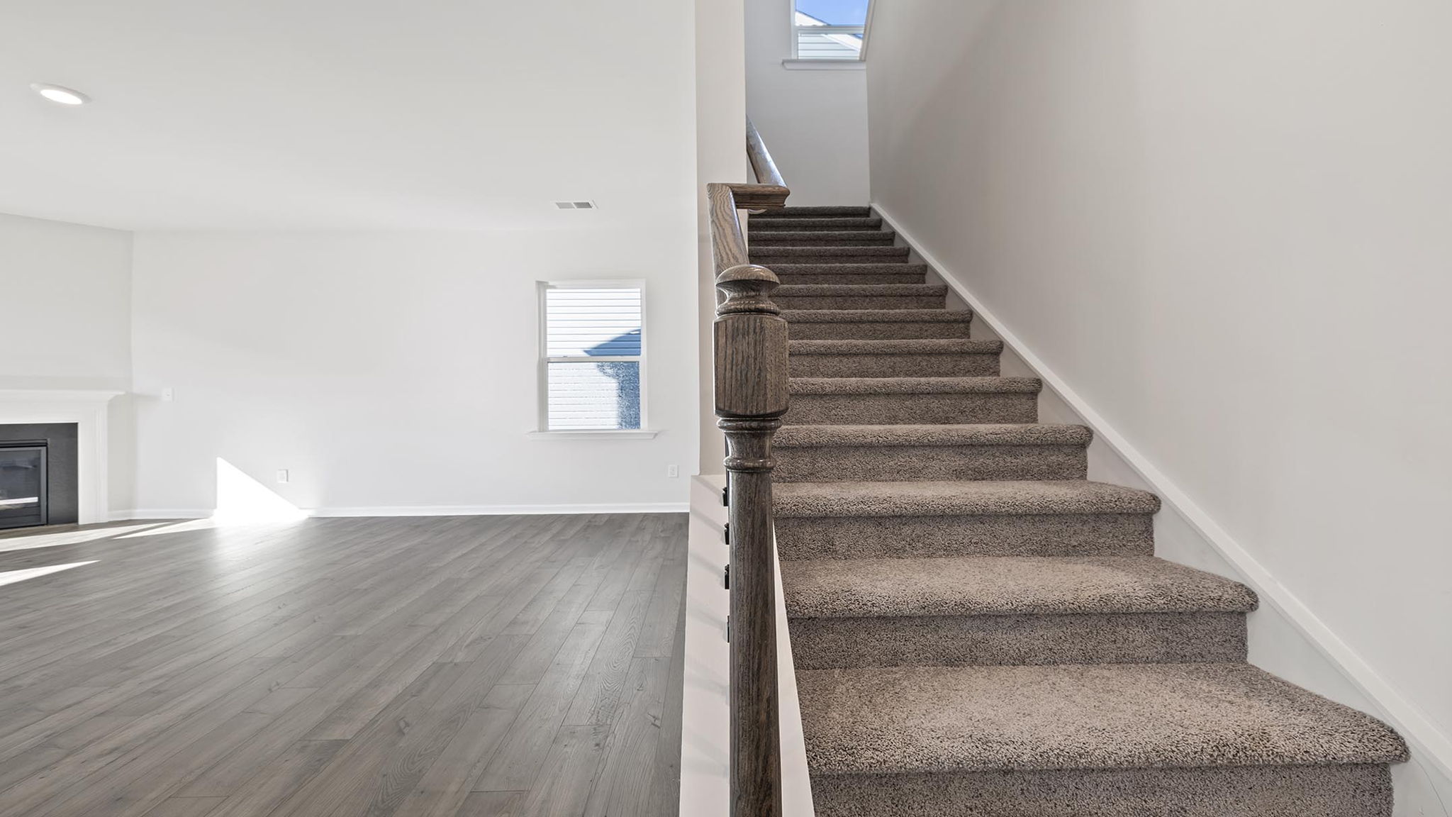 Stairs to second level with stairs.