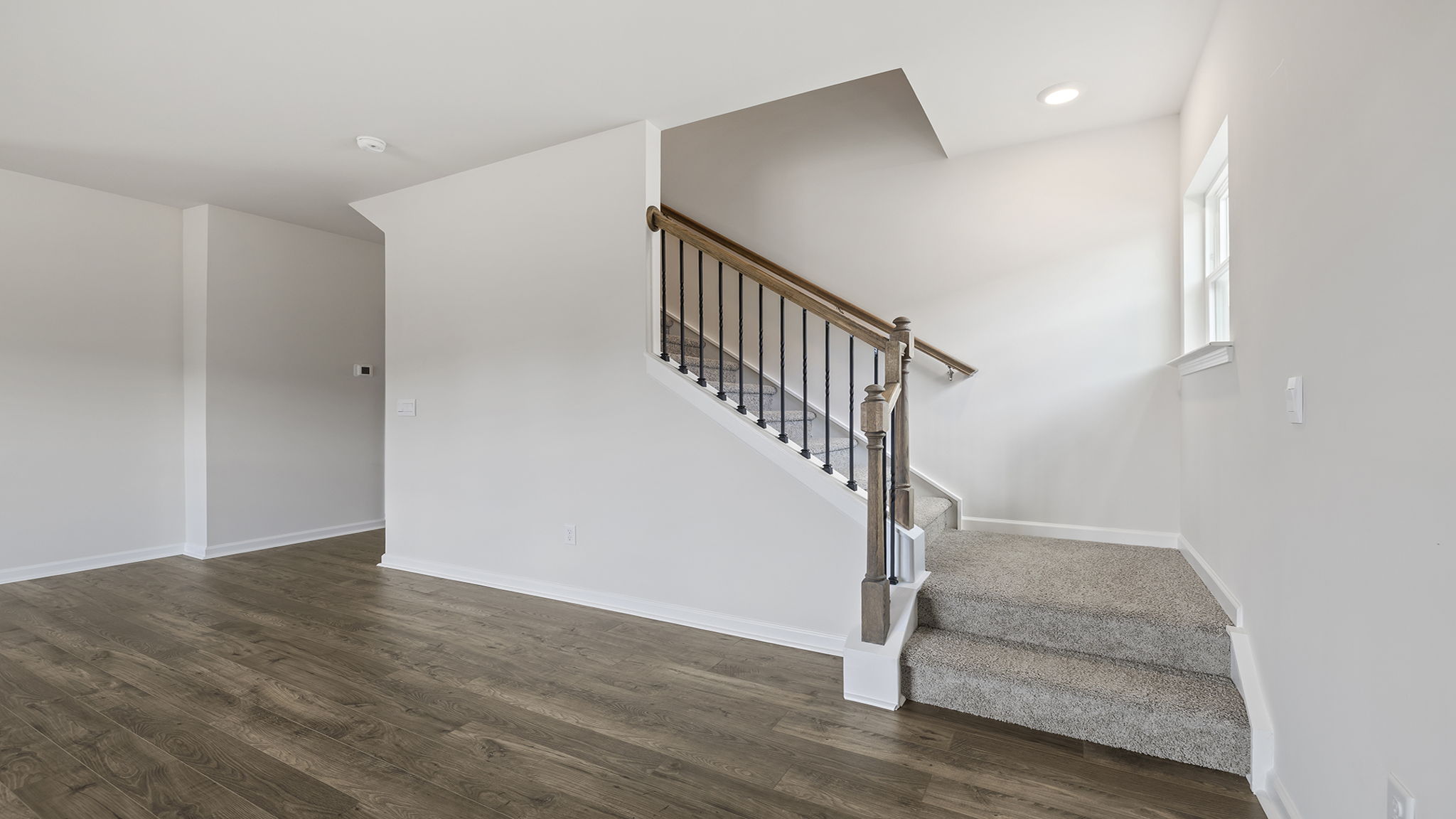 View of stairwell to the upper level.