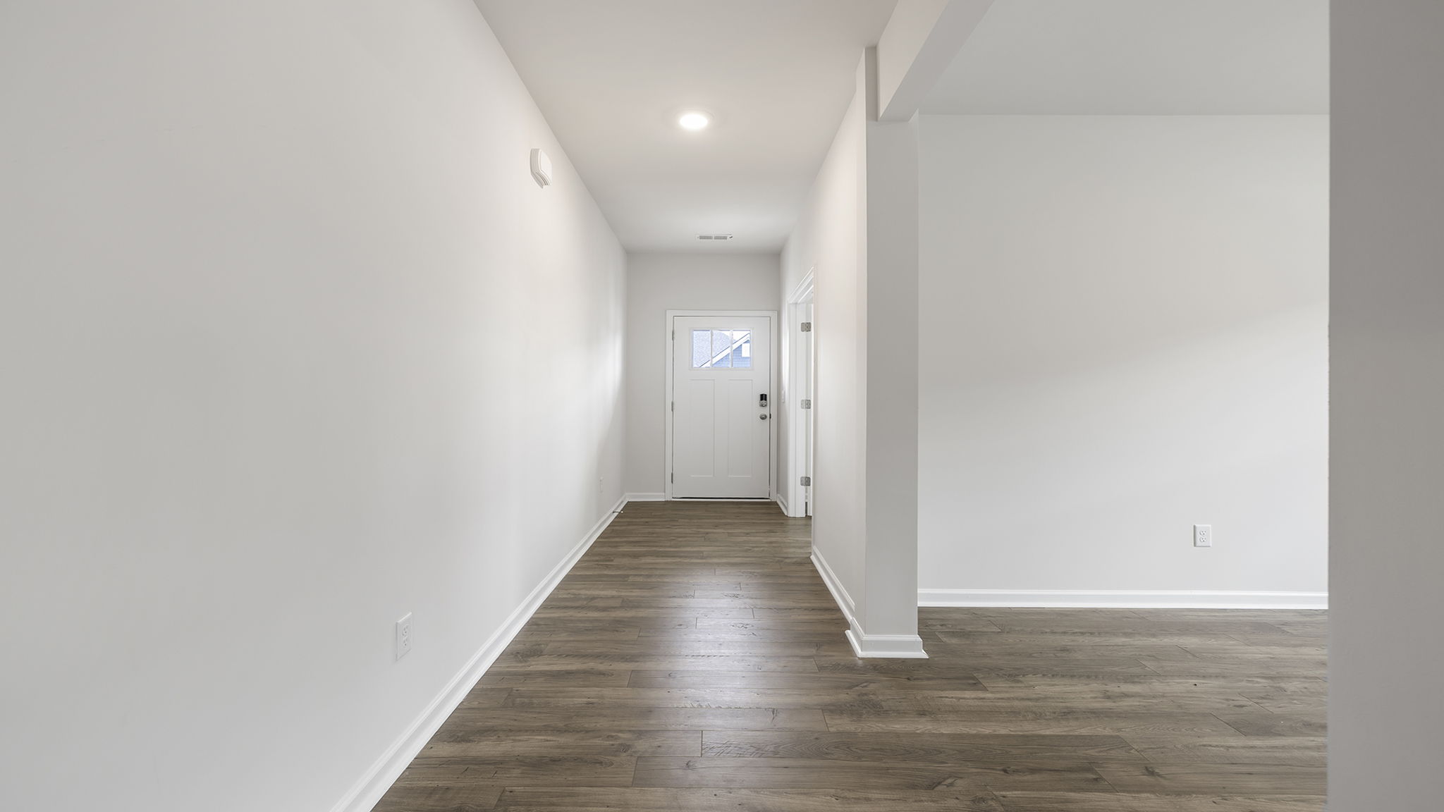 View of hallway to the living area and entrance to the study.