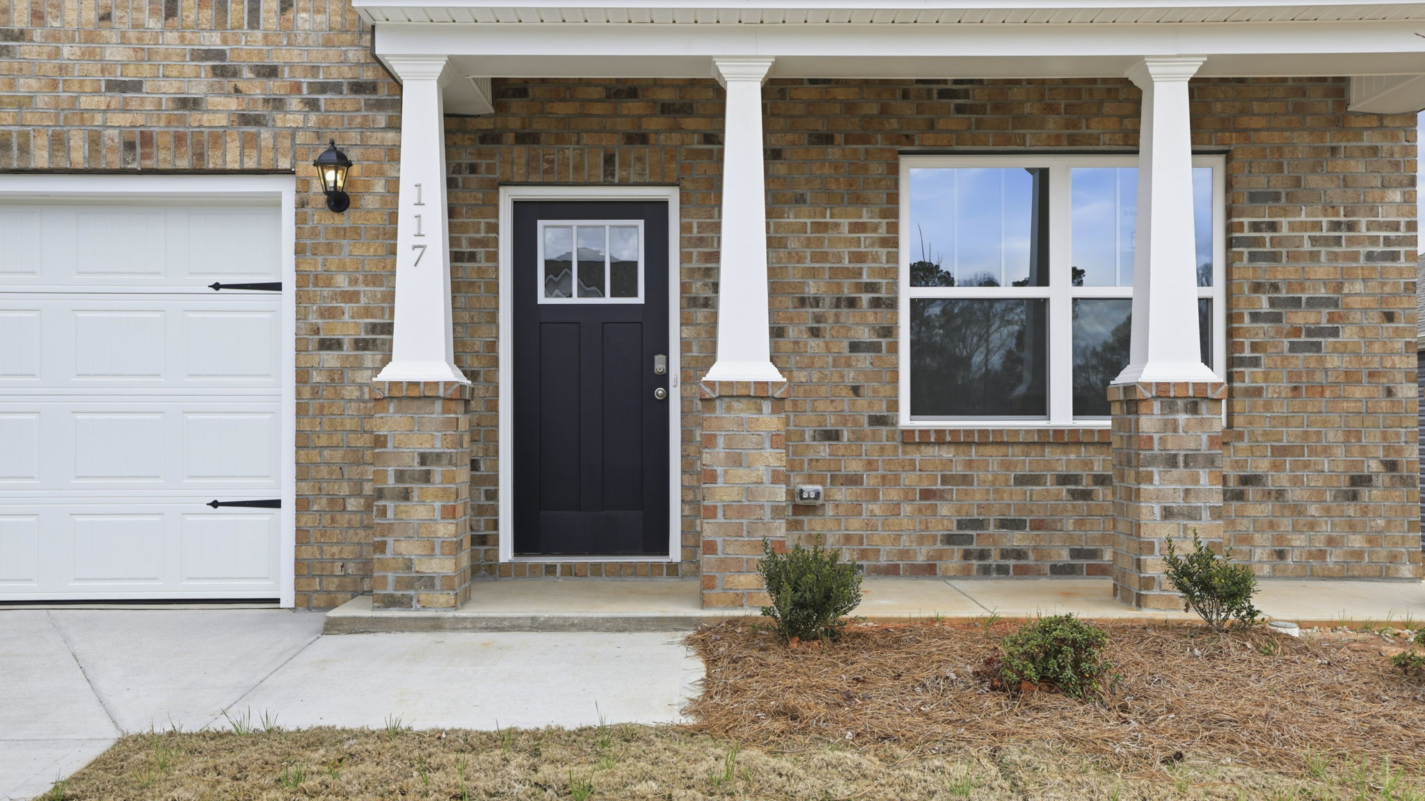 Inviting entry with front porch.