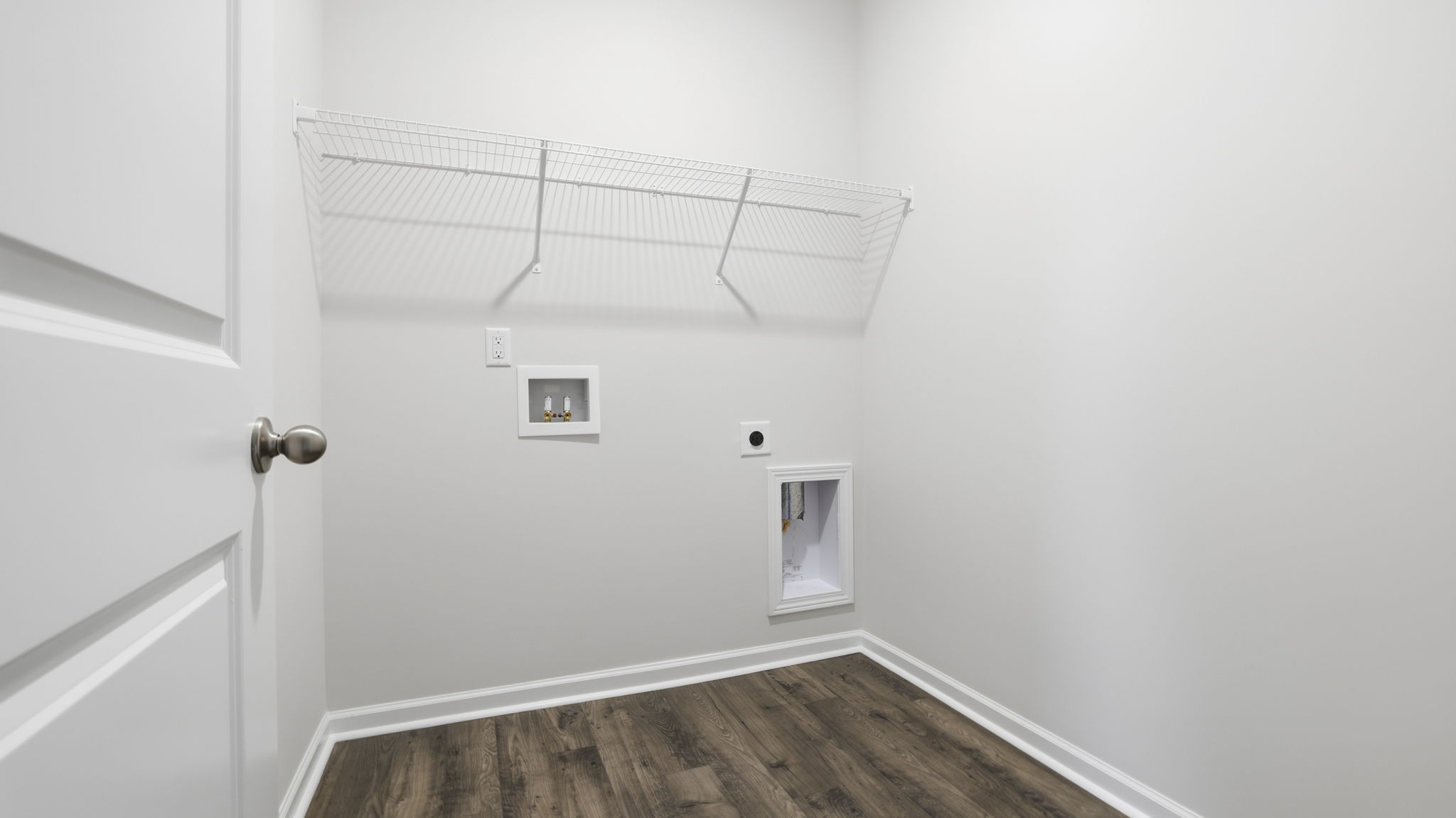 Walk-in laundry room.