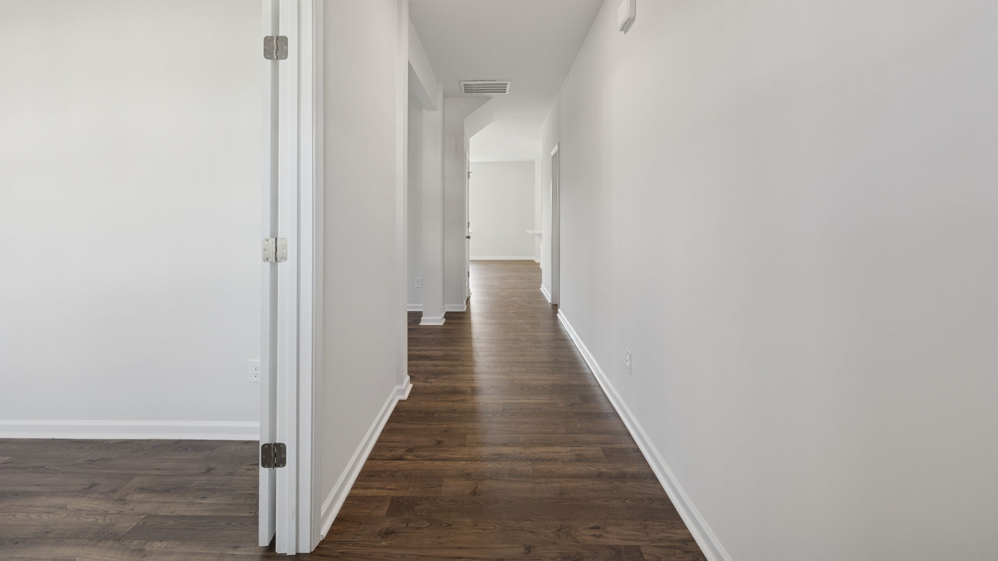 Entrance and view of the study on the left of the hallway.