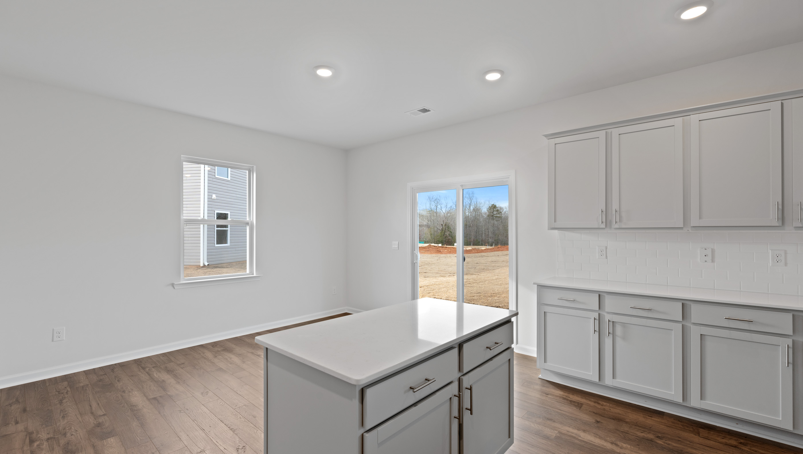 Kitchen island with granite counterrops.