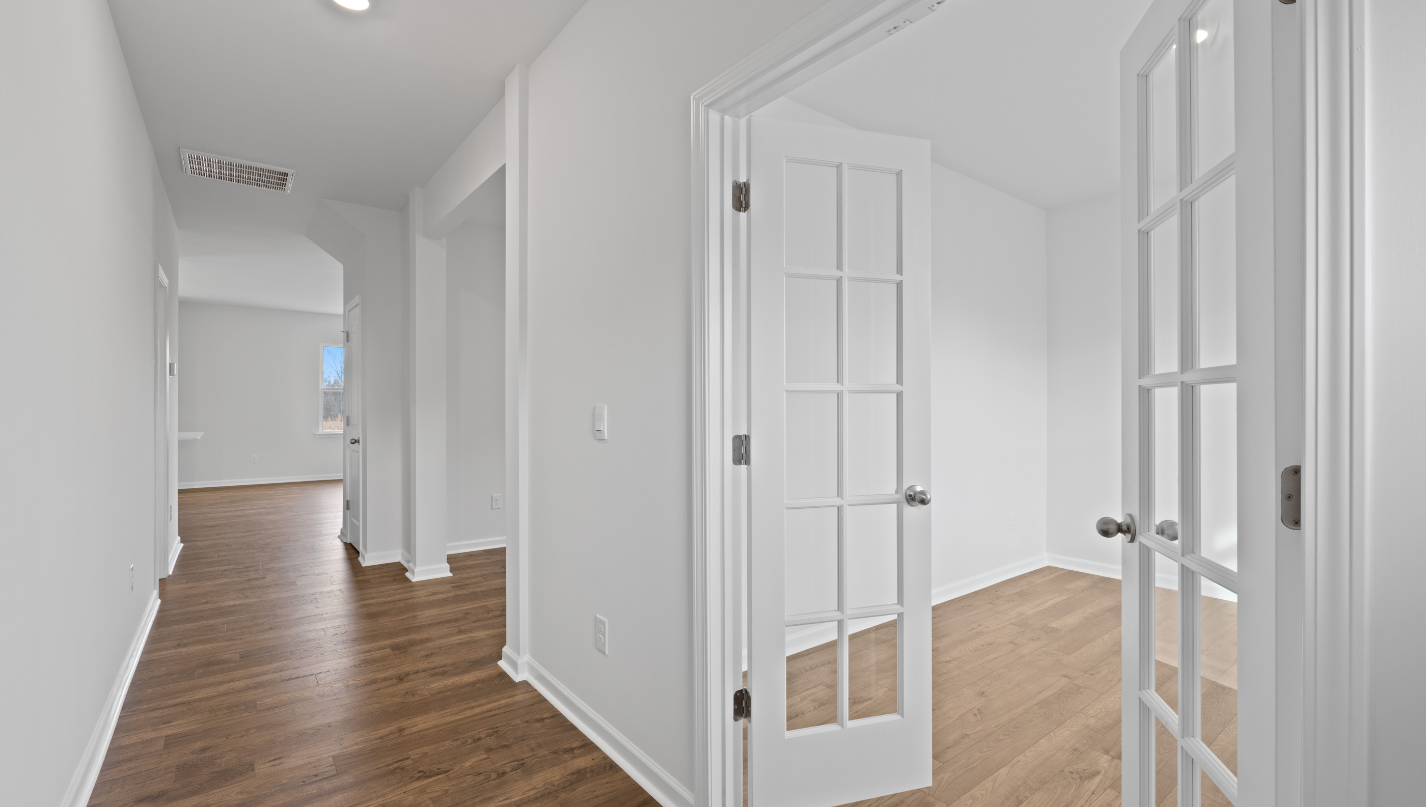 Entrance and view of study and hallway to the living area.