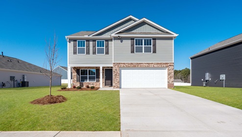 Front exterior of Penwell with 2 car garage.