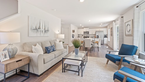 Family room with view of kitchen.