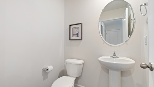 Bathroom with toilet and sink.