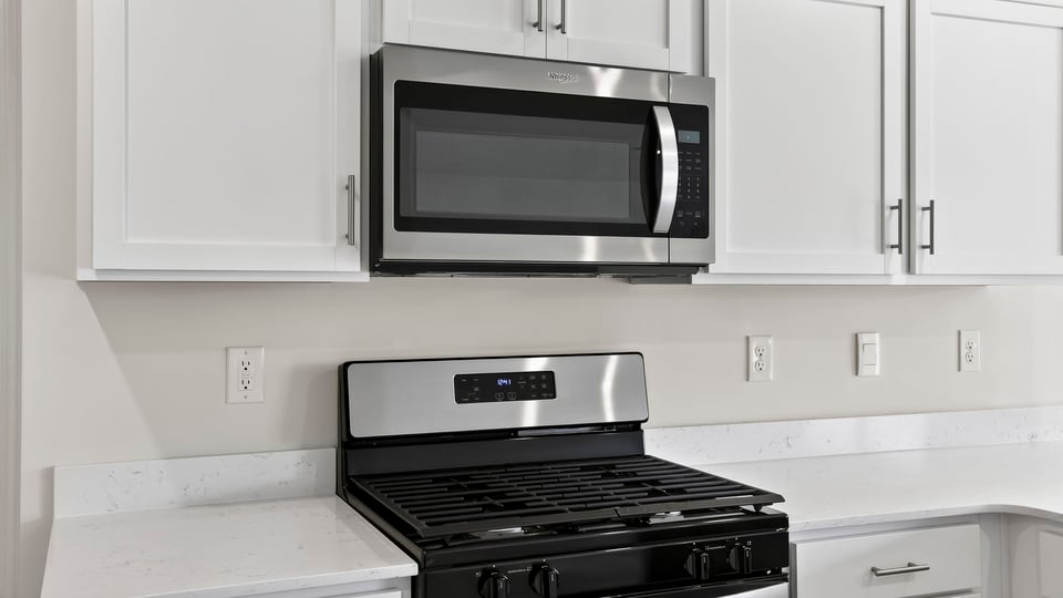 Gas range and microwave.
