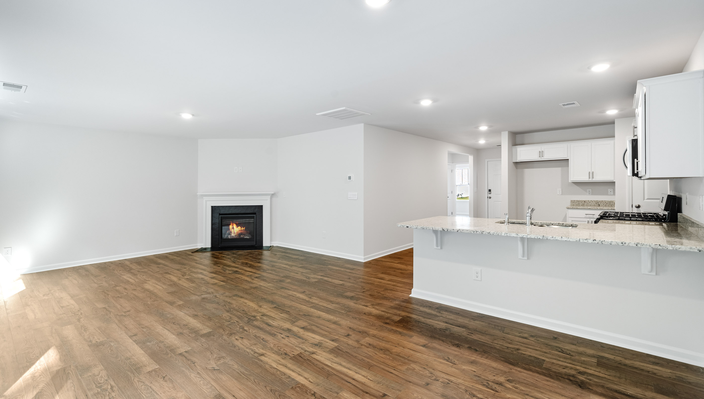 Family room with fireplace.