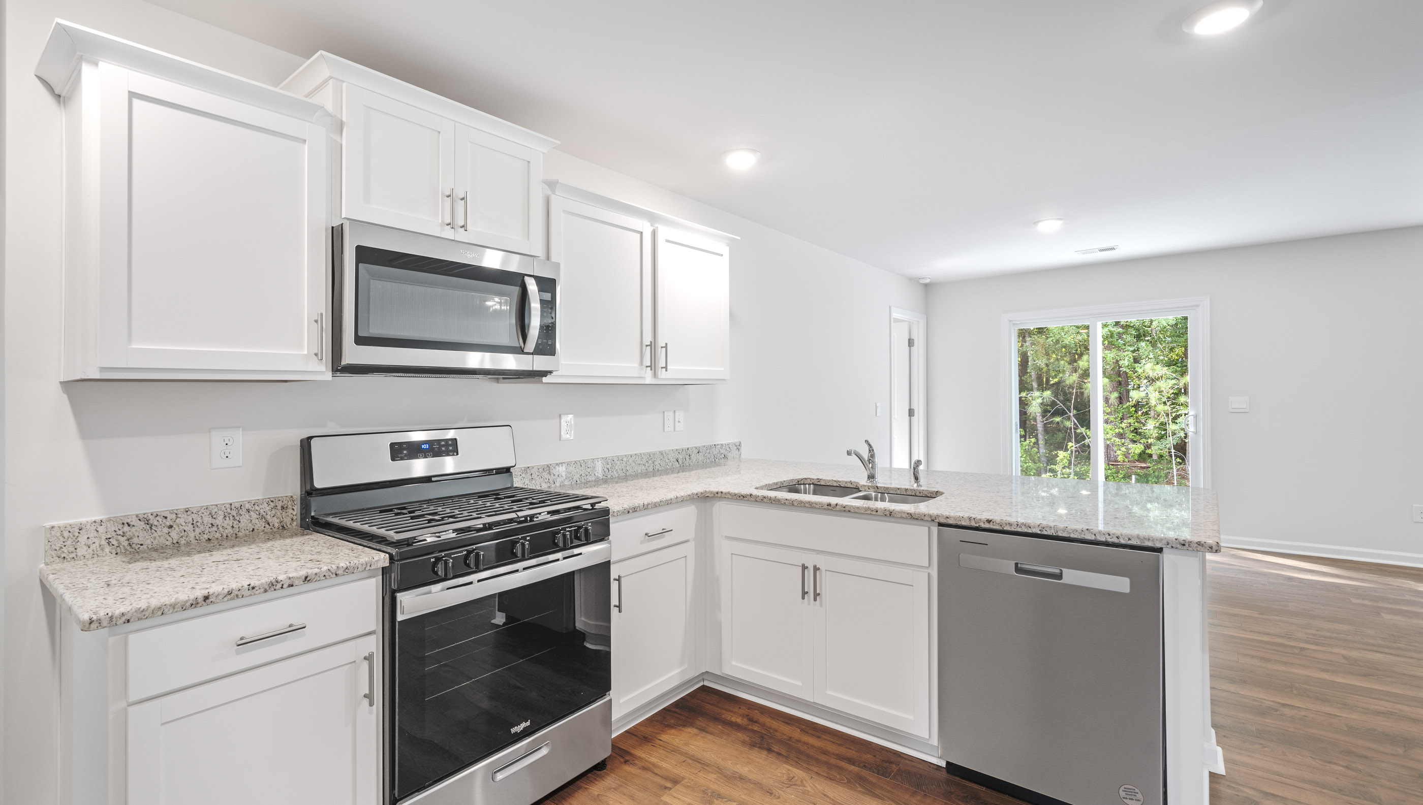 Kitchen with stainless steel appliances.