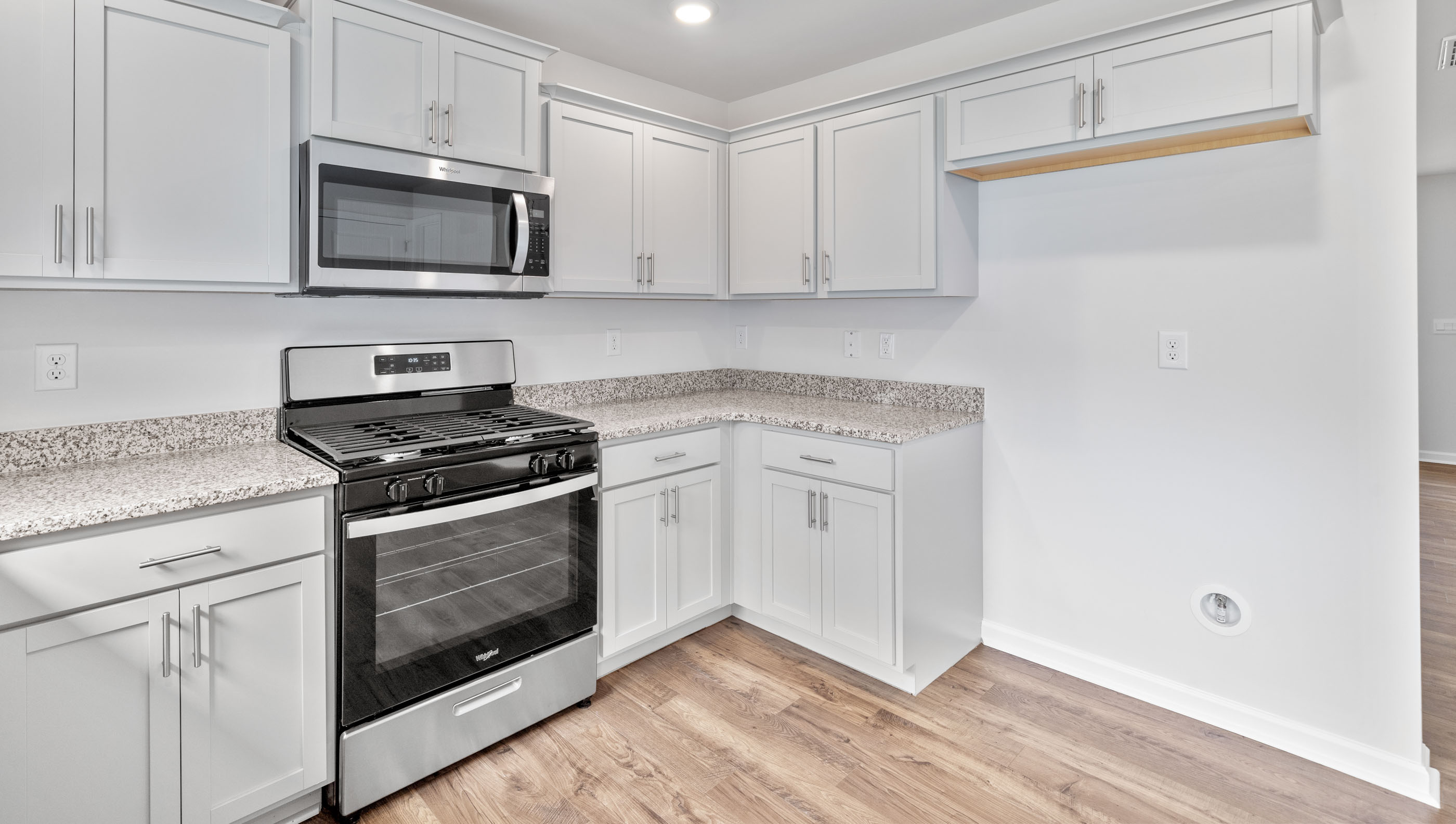 Kitchen with stainless steel appliances.