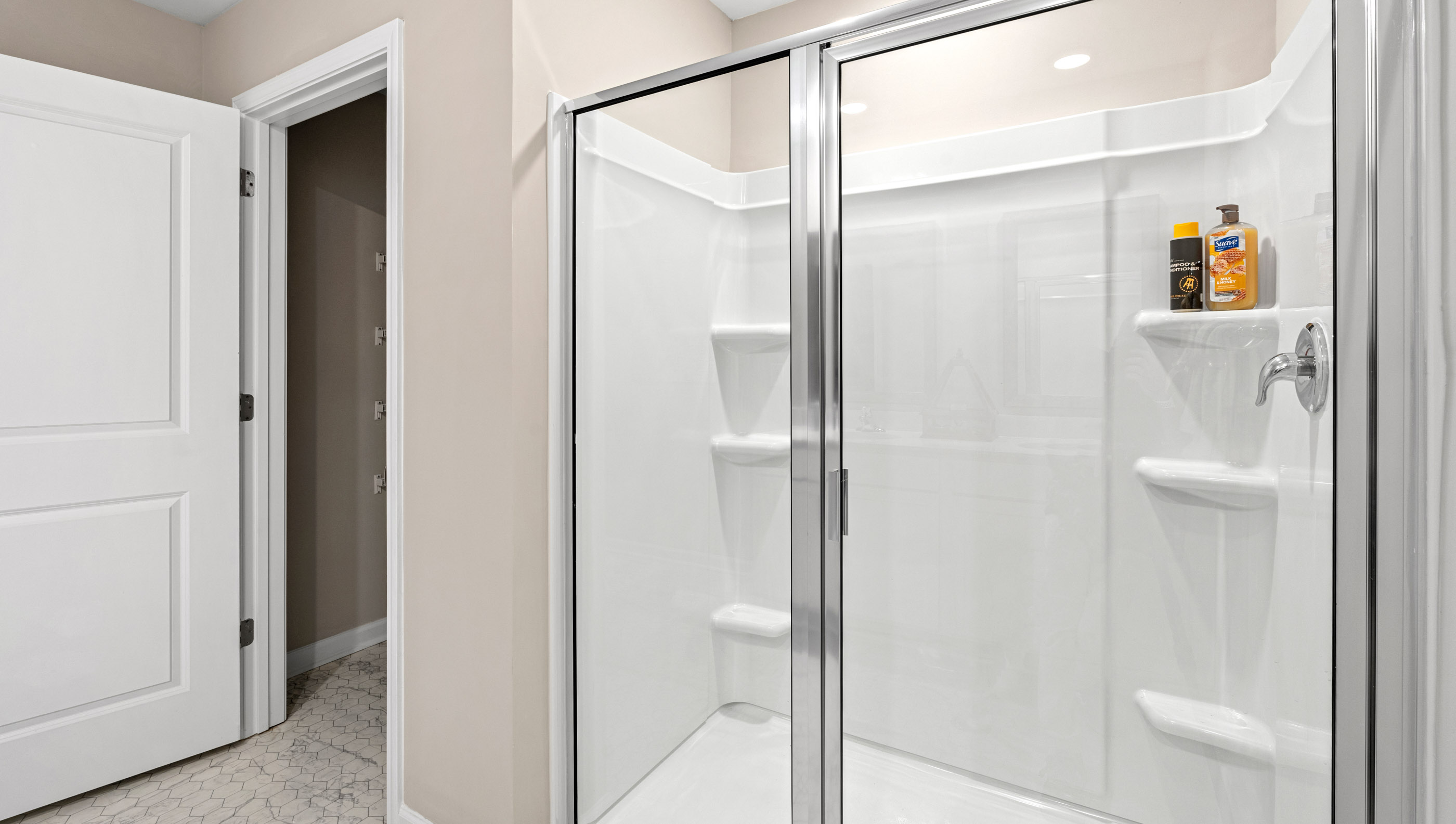 Bathroom with walk in shower.