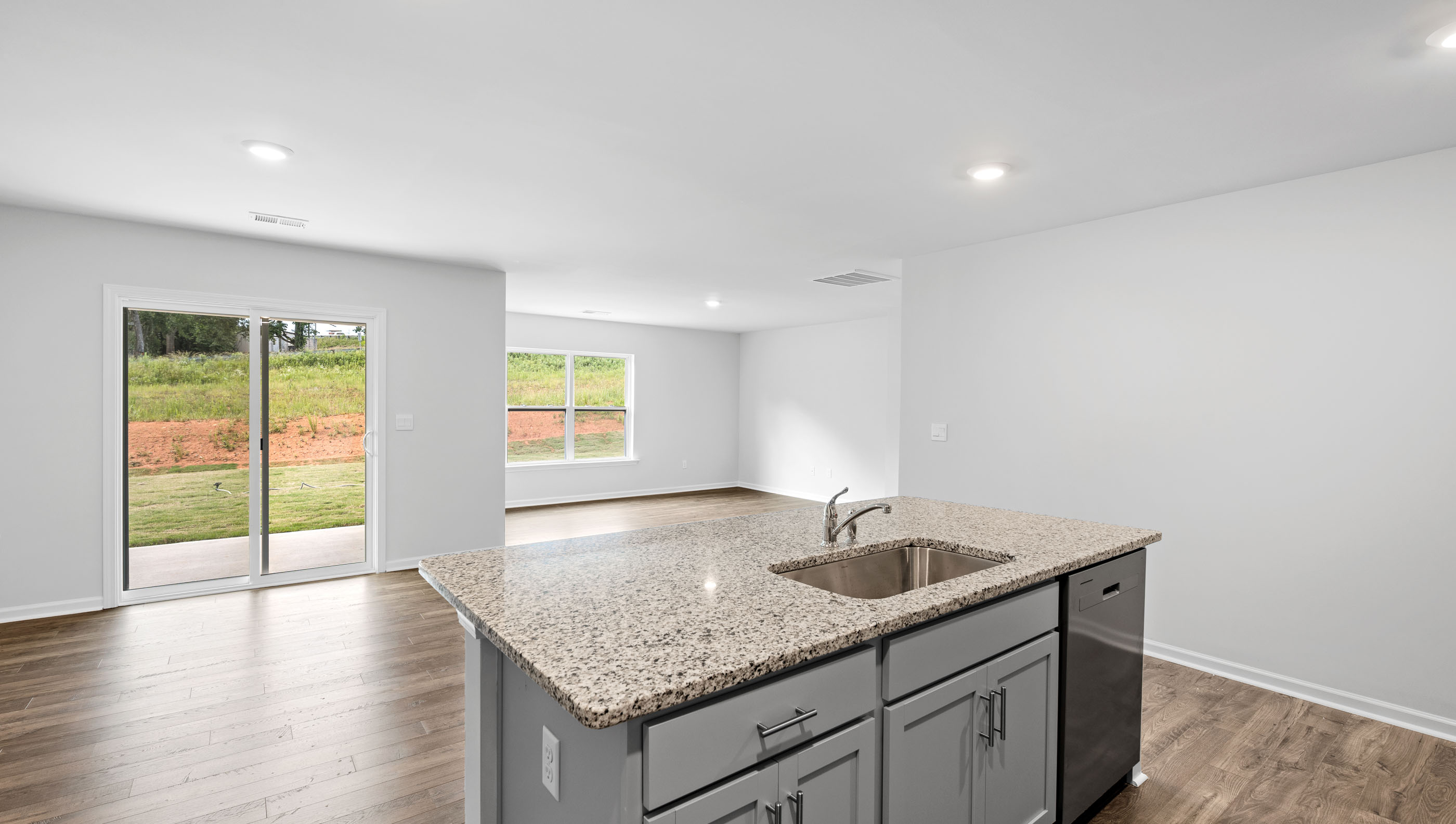 Kitchen with island and countertops.