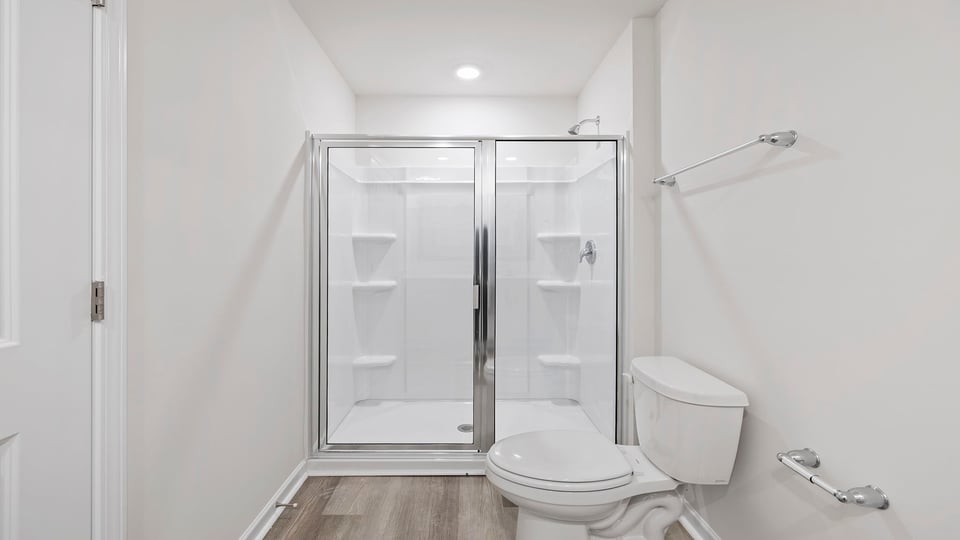 Bathroom with walk in shower.