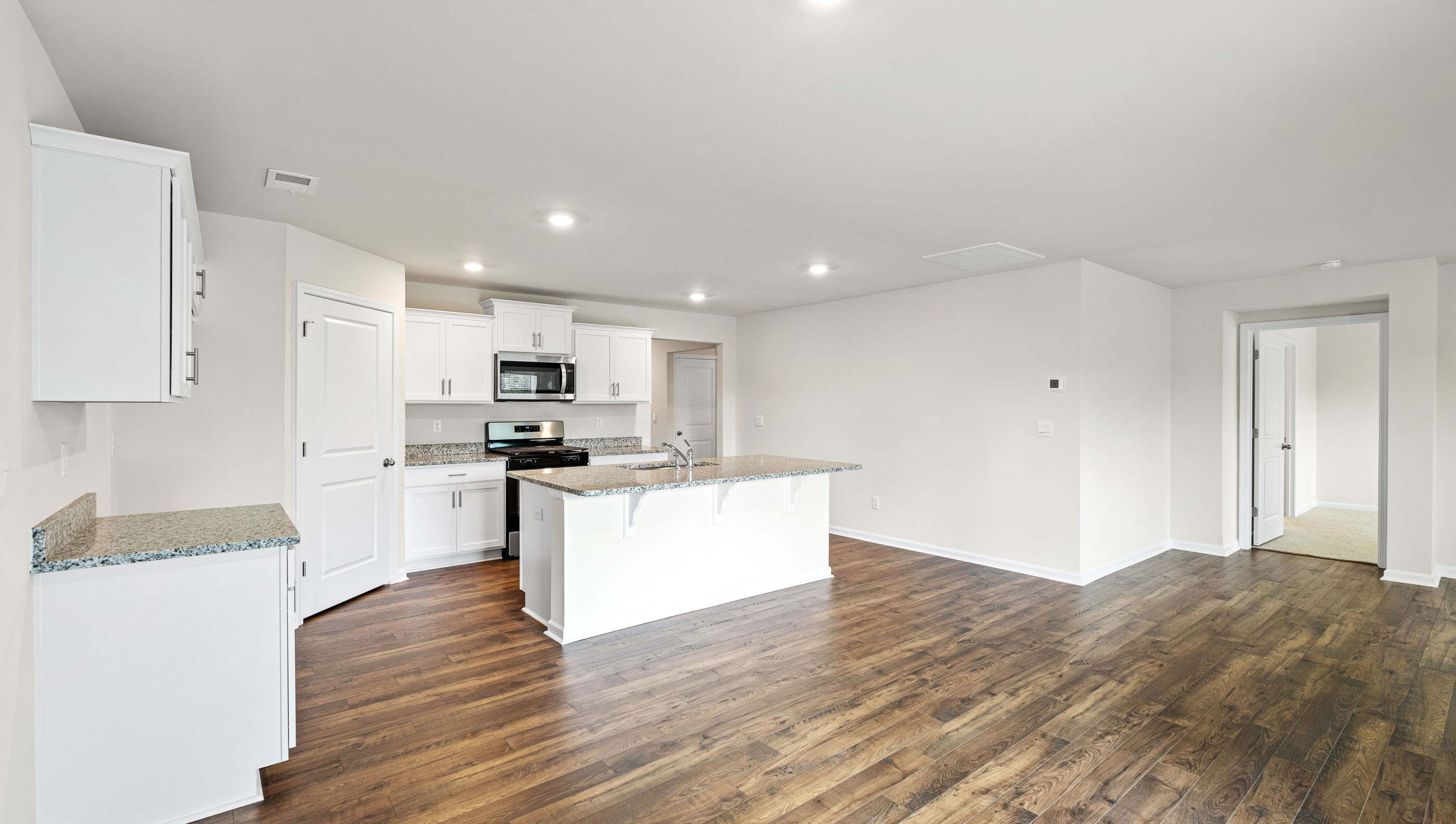 Dining room facing kitchen.