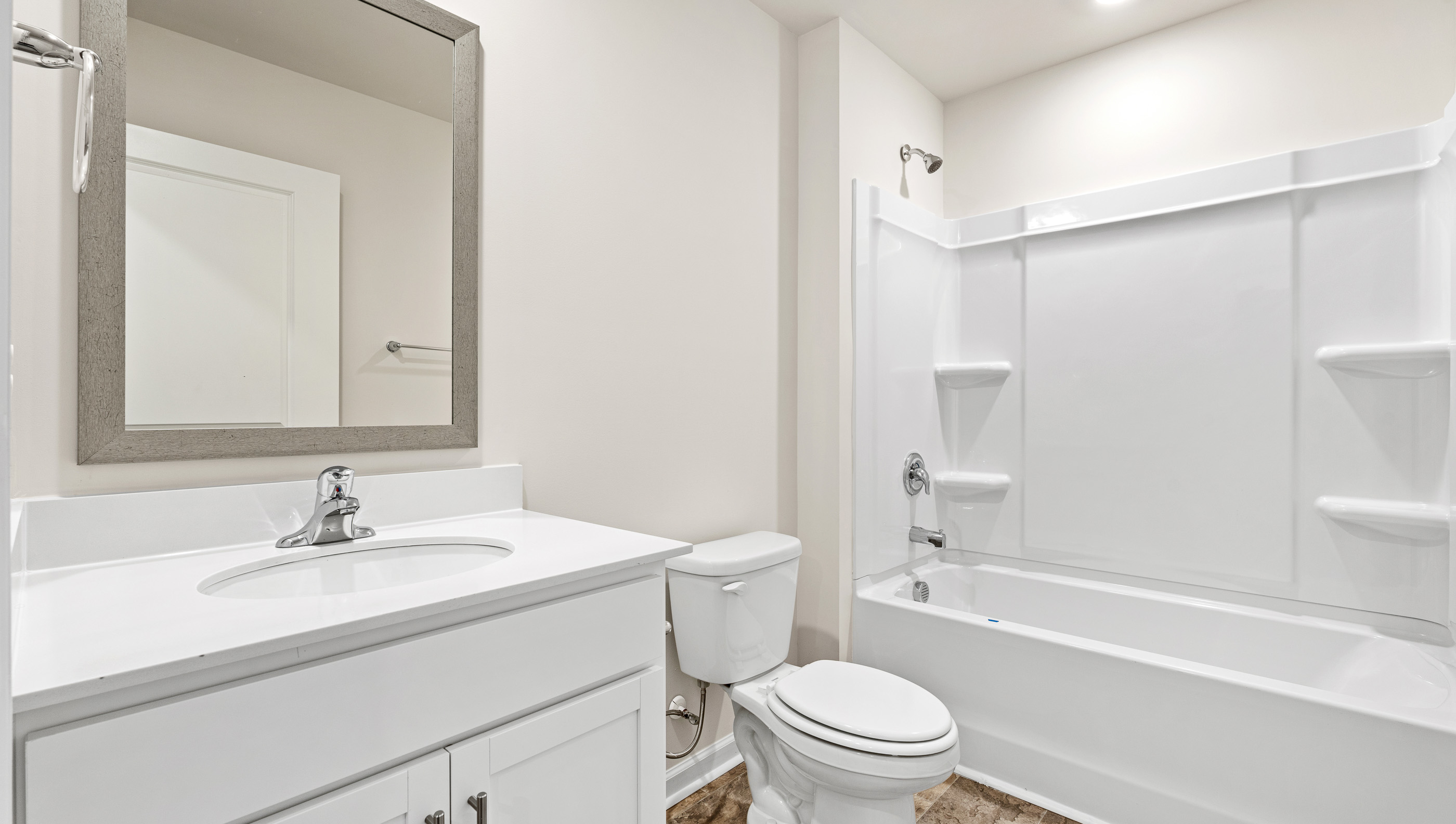 Bathroom with vanity and tub.