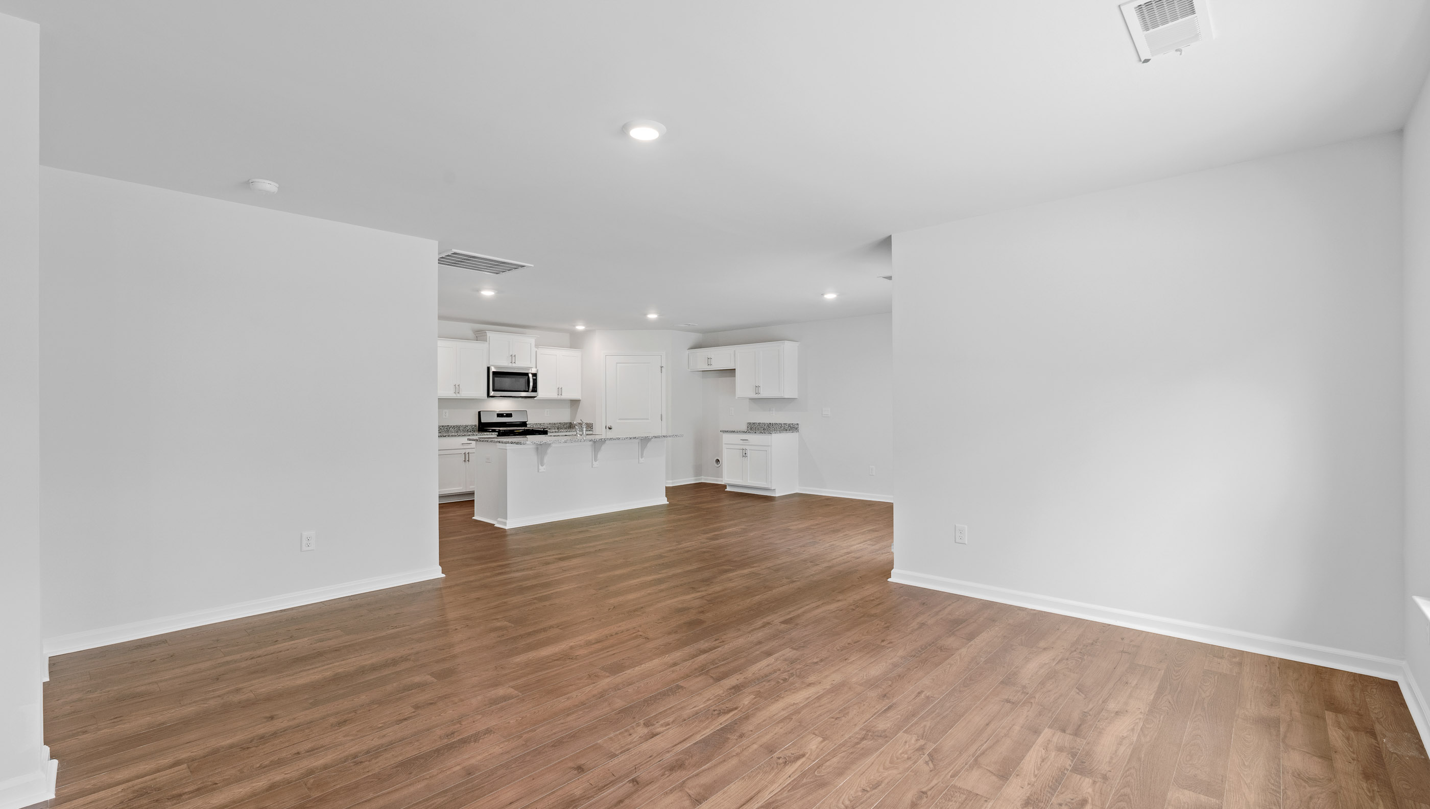 Family room with windows.