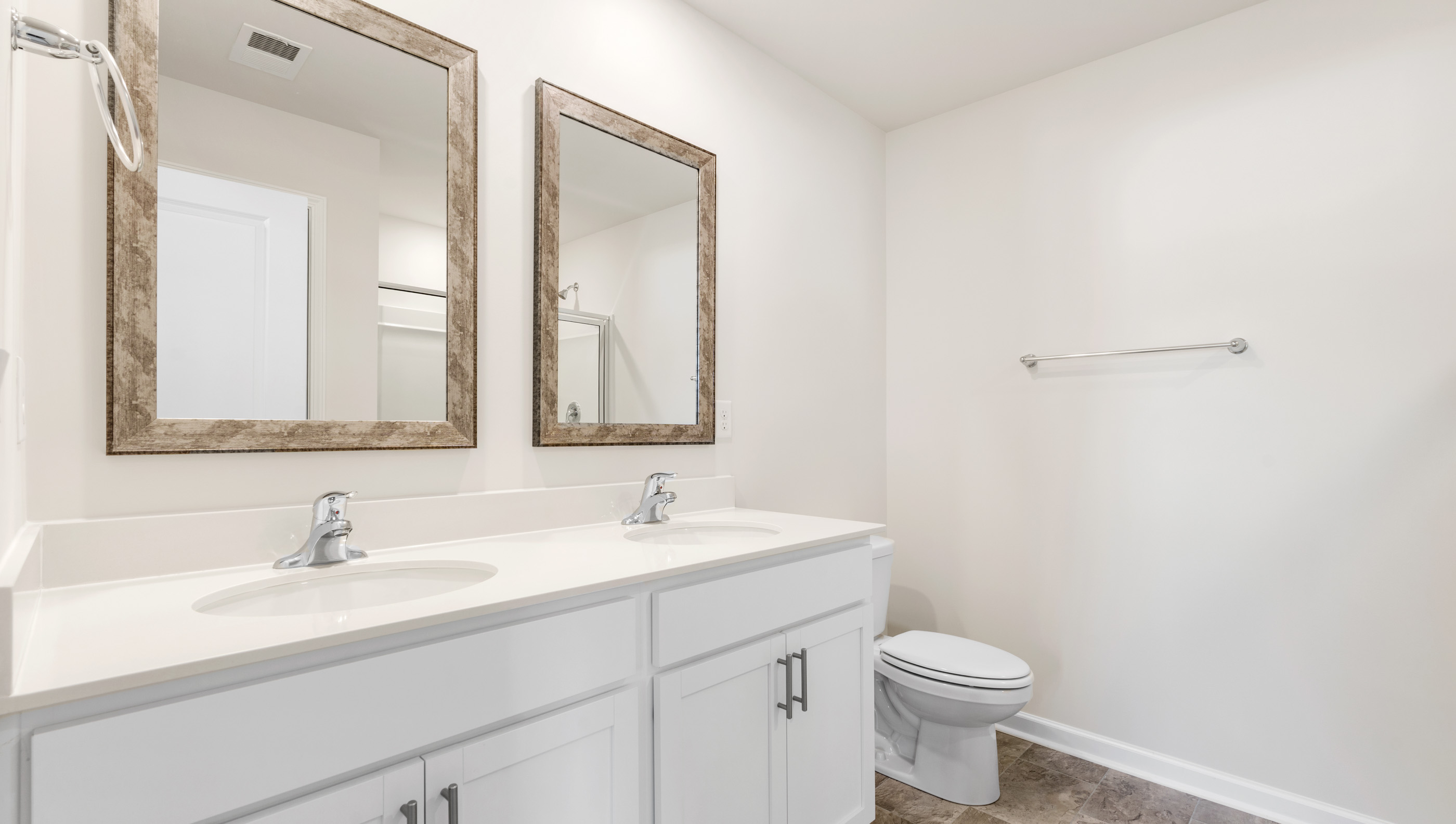 Bathroom with double vanity sink.