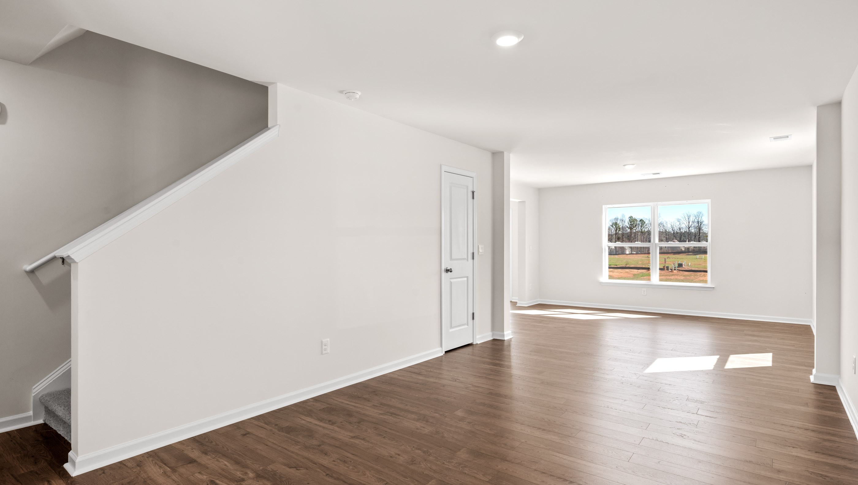 Entry way into home with view of stairs,